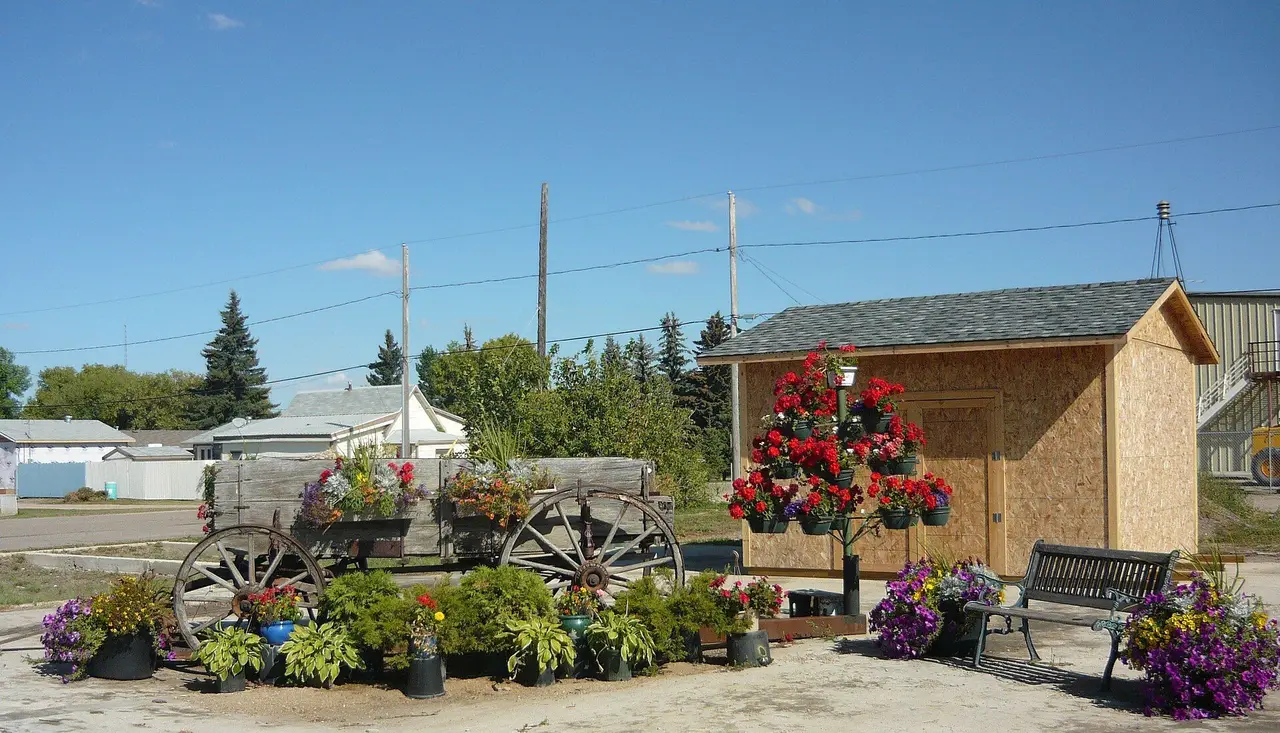 Floral display with old wagon in the park, 2009
